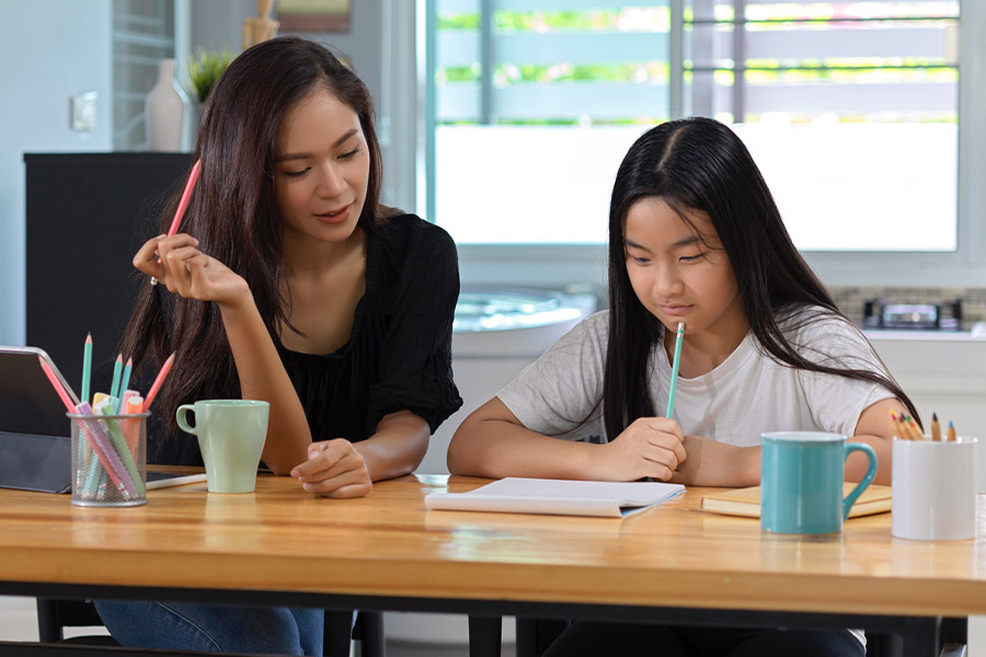 student and tutor together at a desk in Philadelphia